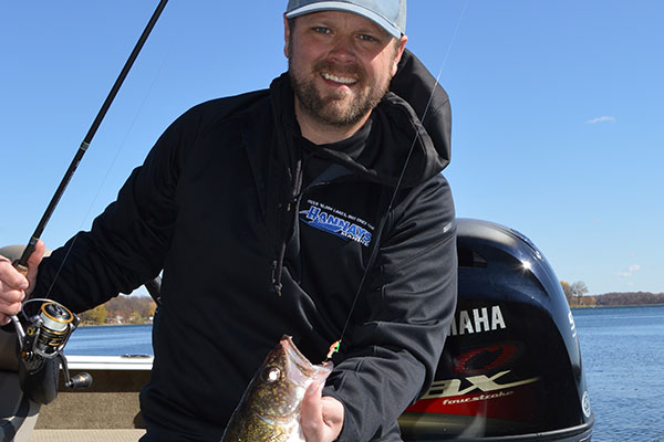 Fishing friend Tom Ferdinandt with an autumn walleye.