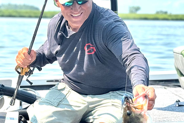 Mike Frisch lands a bass. He’s impressed with several new bass fishing product offerings for 2026.
